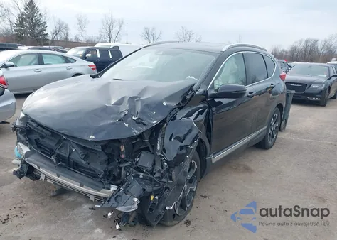 2018 Honda Cr-V Touring z USA, uszkodzony, nr VIN 7FARW2H9XJE067233